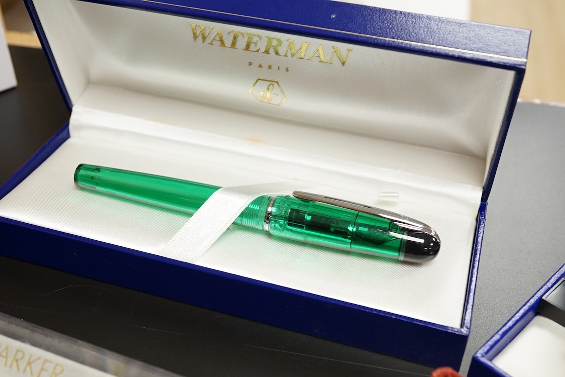 Four assorted cased Waterman pens, elven other assorted pens including Scheaffer and Parker and an engine turned silver pen.